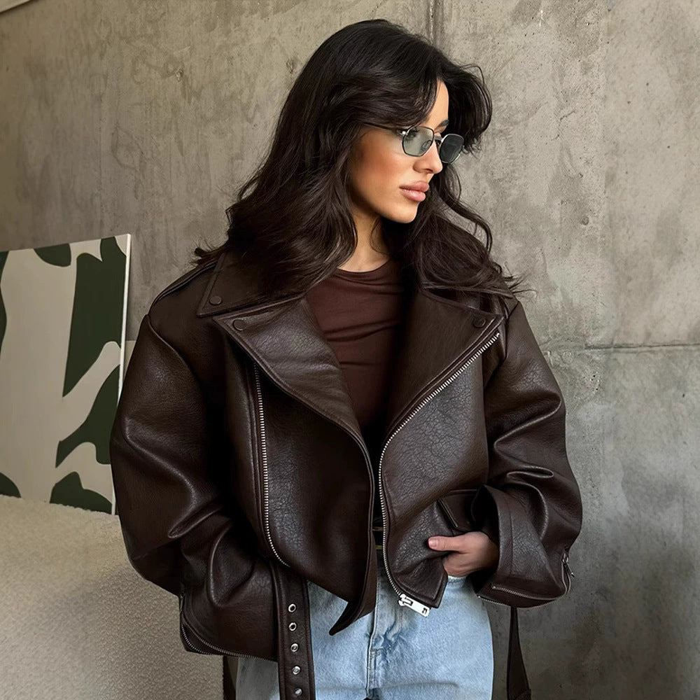 Women's brown oversized moto jacket, zip-front, wide lapels, belted waist