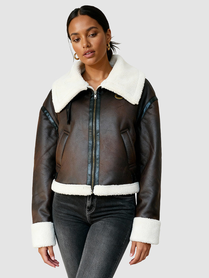 Women’s cropped aviator jacket in dark brown faux leather, zip front, white sherpa trim