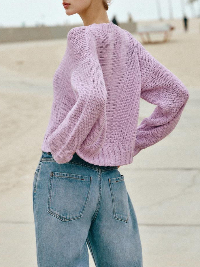 Light purple cropped open-knit cardigan with ribbed hem and cuffs, back/side view
