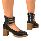 Black croc-embossed platform ankle strap pumps with block heels and triple buckle cuff