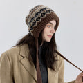 Fair Isle knit earflap bonnet with long tie cords, brown and cream zigzag pattern