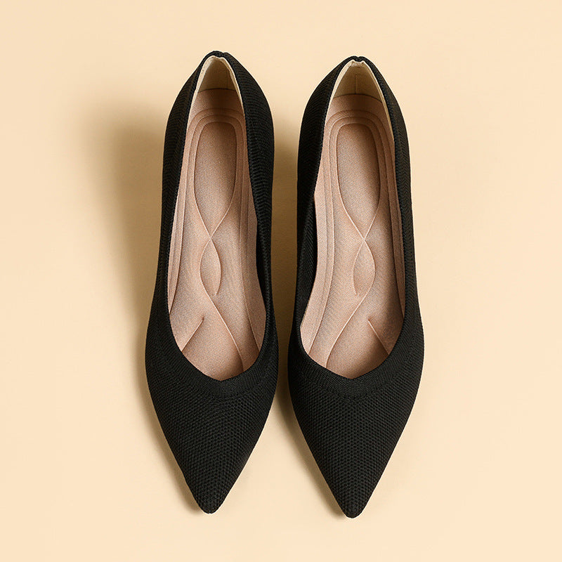 Pair of women's pointed-toe knit stiletto pumps, black, front view