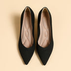 Pair of women's pointed-toe knit stiletto pumps, black, front view