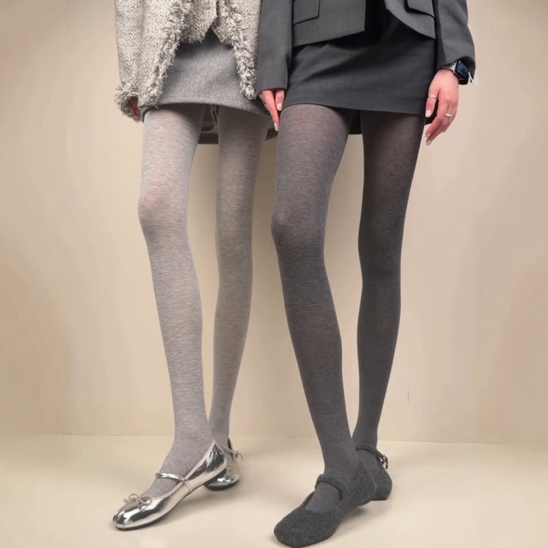 Light and dark gray heathered tights shown from waist to feet