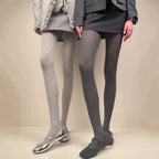 Light and dark gray heathered tights shown from waist to feet
