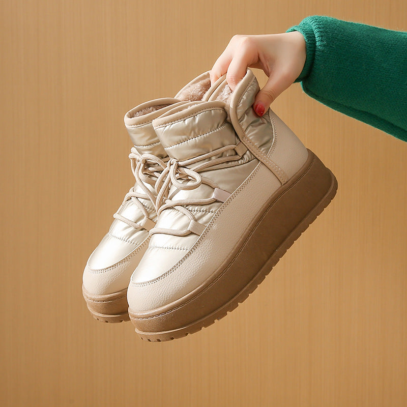 Fleece-lined lace-up puffer snow boots in beige with quilted upper and platform sole