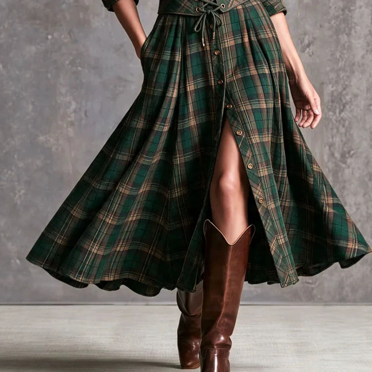 Green plaid maxi dress with side slit, long sleeves, button front, lace-up corset belt.