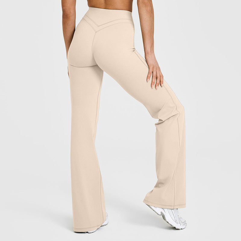 Women’s high-waisted crossover flare leggings in beige, wide bootcut pant legs