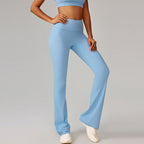 Sky blue high-waisted flare yoga leggings with wide bootcut hems and smooth finish.