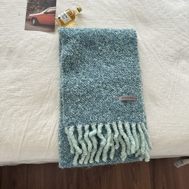 Boucle knit scarf, turquoise with chunky fringe tassels and woven logo patch