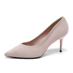 Women’s light pink knit stiletto pumps with pointed toe and slim high heel.
