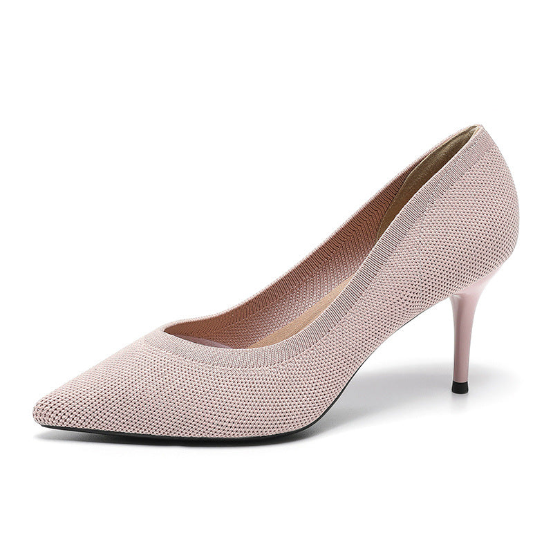 Women’s light pink knit stiletto pumps with pointed toe and slim high heel.
