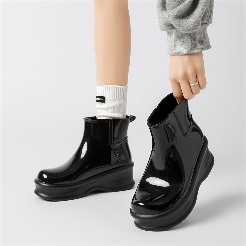 Women's black glossy ankle rain boots, chunky platform pull-on style