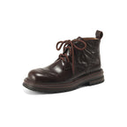 Women’s dark brown lace-up ankle boots with round toe, chunky lug sole, pull tab
