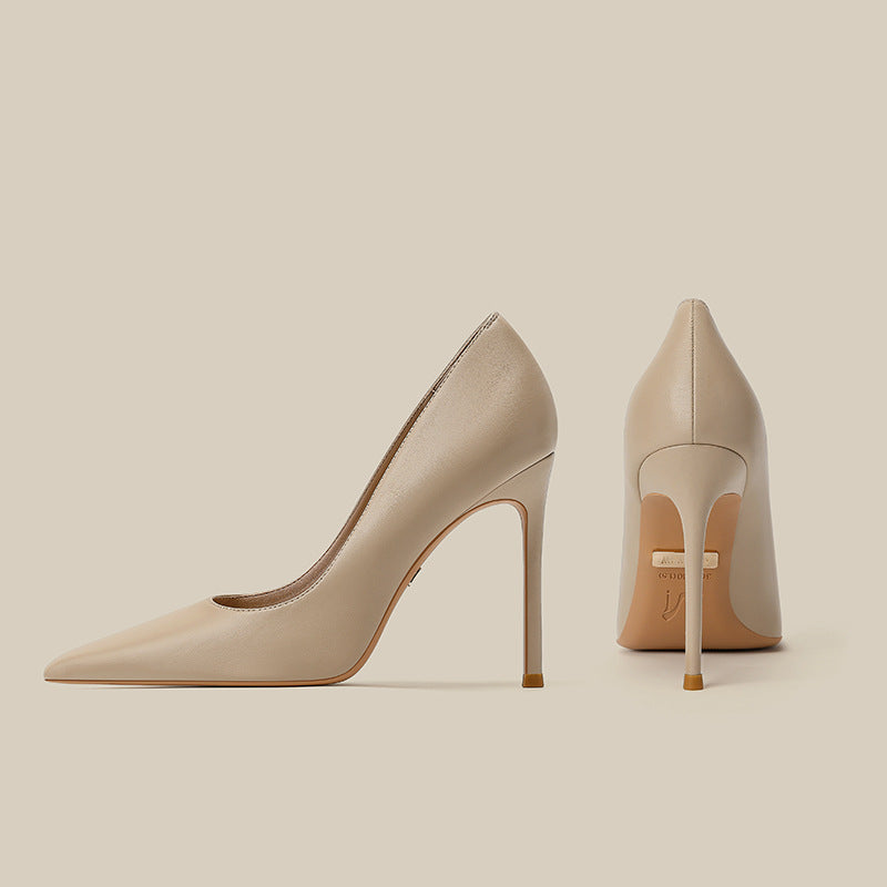 Women’s nude pointed toe stiletto heels with slender gold-tone heel, front and back view