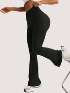 Black high-waist flare leggings with side pockets, full-length view