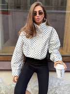 White polka dot cropped puffer jacket with stand collar and zip front