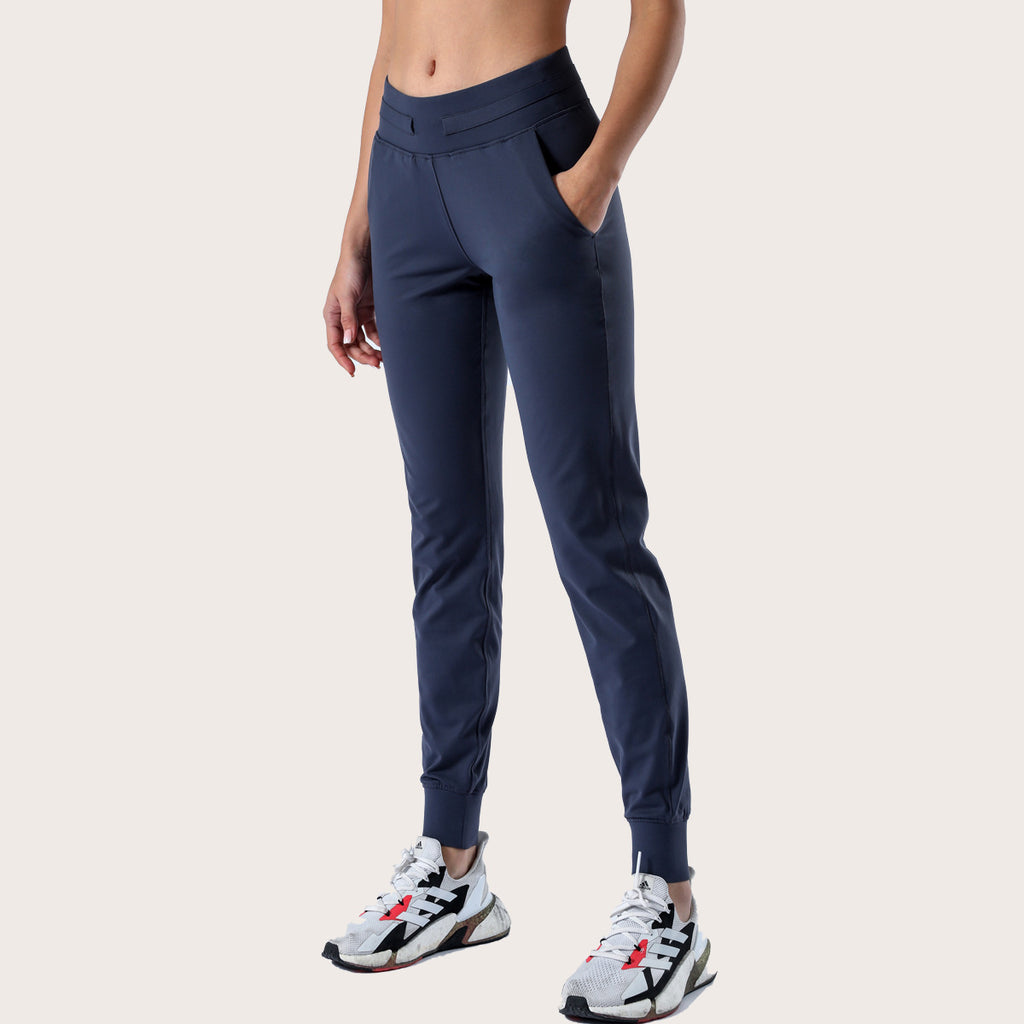 Women’s navy slim-fit performance jogger pants with drawstring waist and ankle cuffs