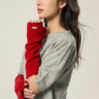 Red fingerless arm warmer gloves with thumbhole, ribbed knit edge