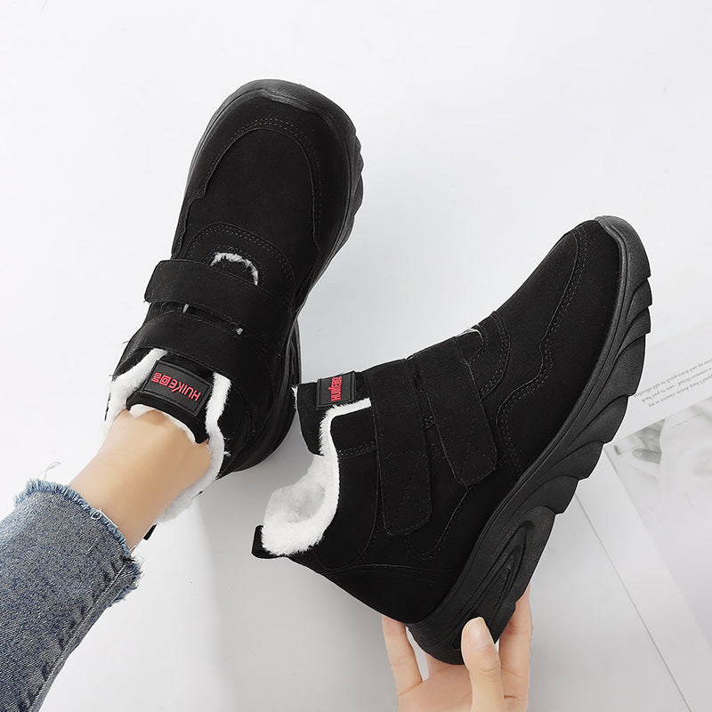 Black high-top winter sneakers with fleece lining and two hook-and-loop straps