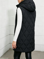 Black long quilted puffer vest with hood; diamond stitching and drawstring detail