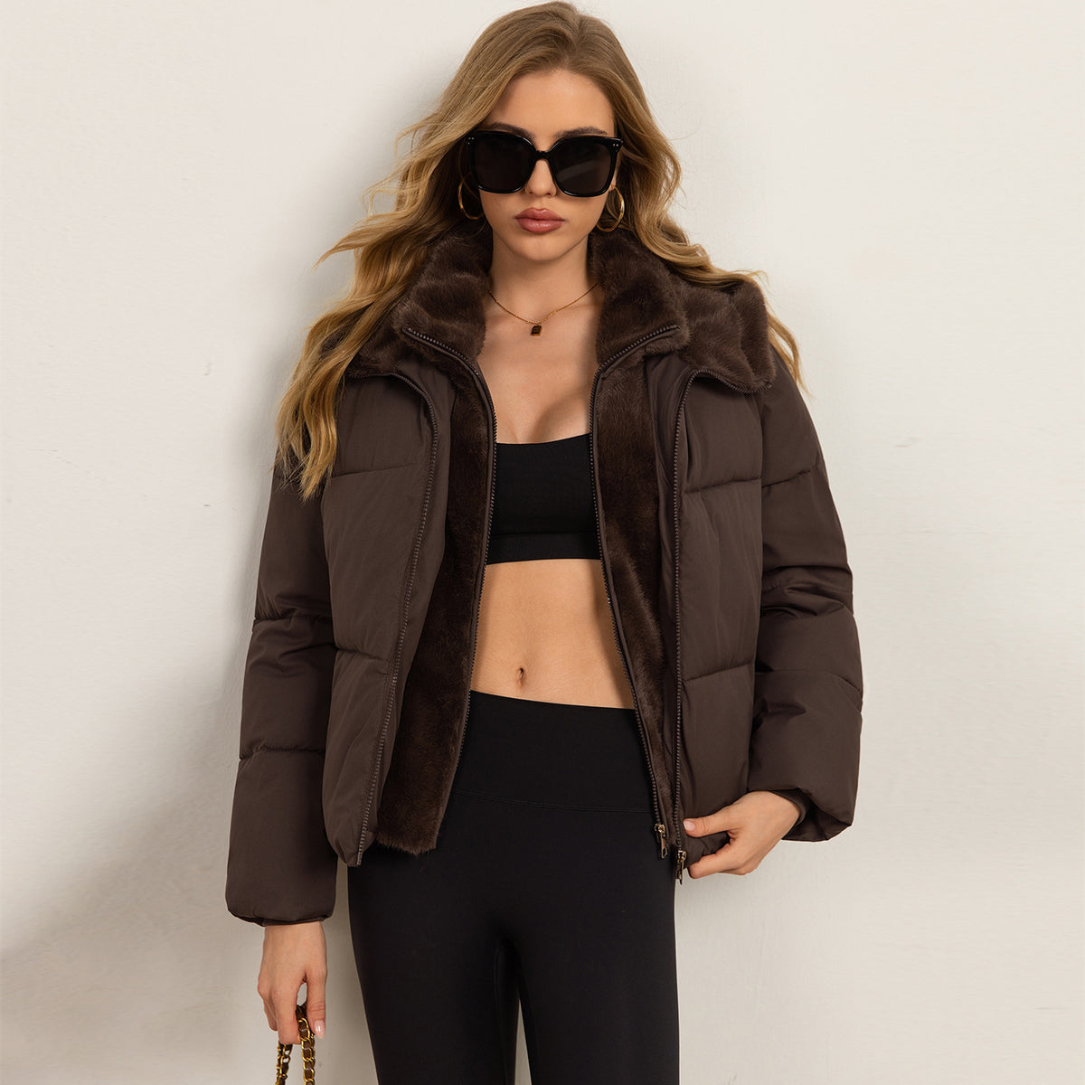 Women’s dark puffer jacket with faux fur stand collar and front zipper, cropped fit