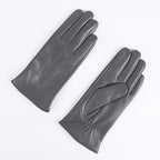 Dark gray leather gloves with three-strap cuffs, fleece-lined winter style.