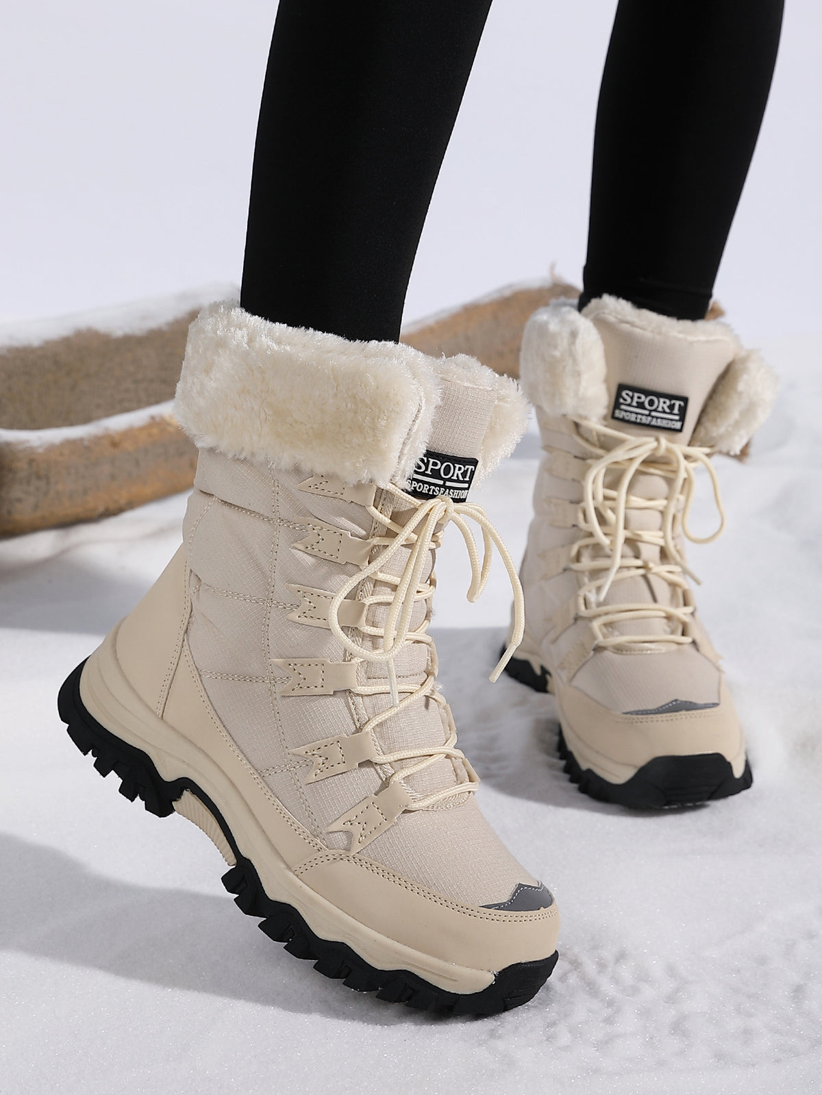 Beige mid-calf snow boots with faux-fur collar, lace-up design, and textured lug sole