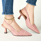 Pink tweed slingback pumps with pointed toe, flared heel, gold chain ankle strap