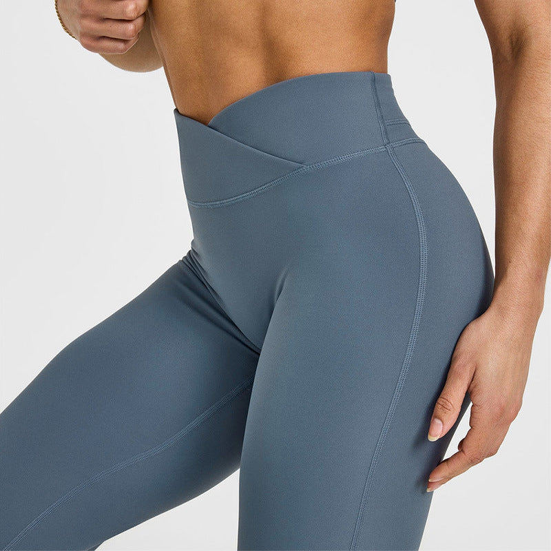 Women’s high-waisted crossover flare leggings, slate blue, waist and leg seam details