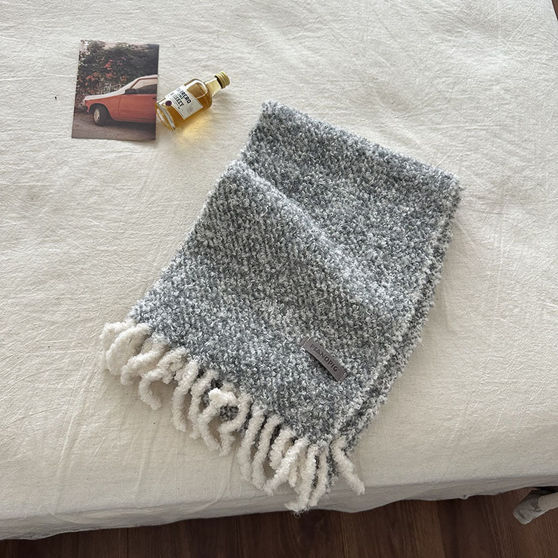 Boucle knit scarf, light gray with long fringe tassels and small logo patch