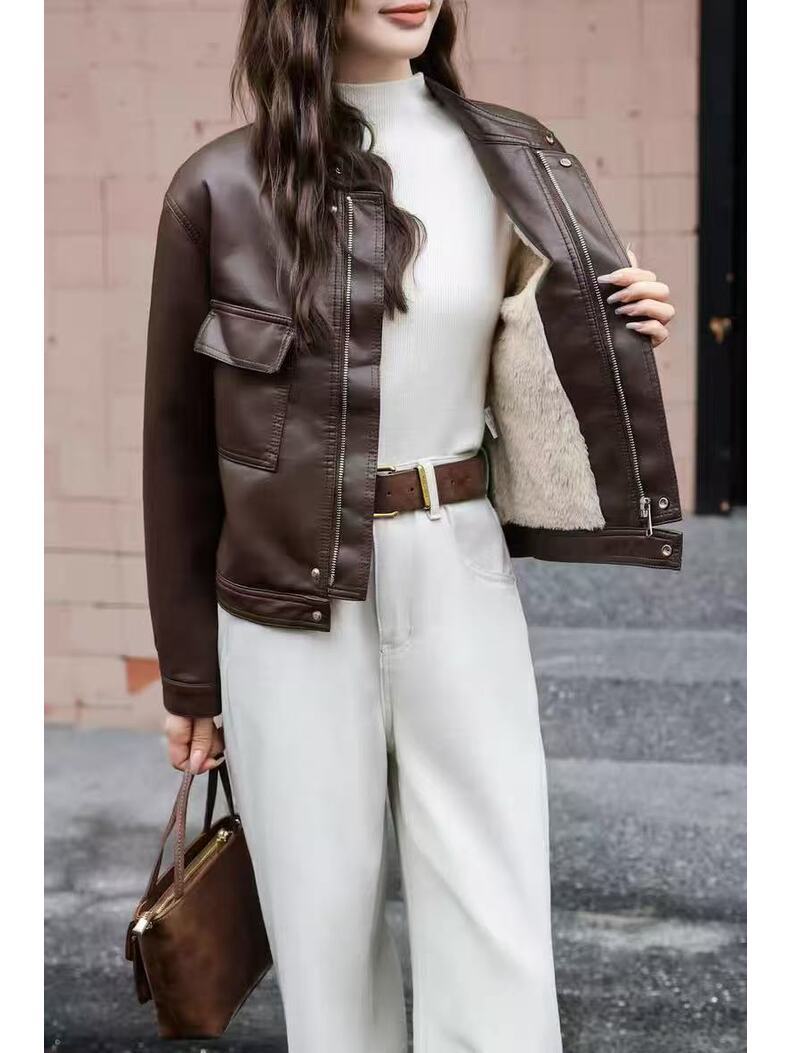 Cropped dark brown faux leather jacket with stand collar, zip front, flap pockets, fuzzy lining