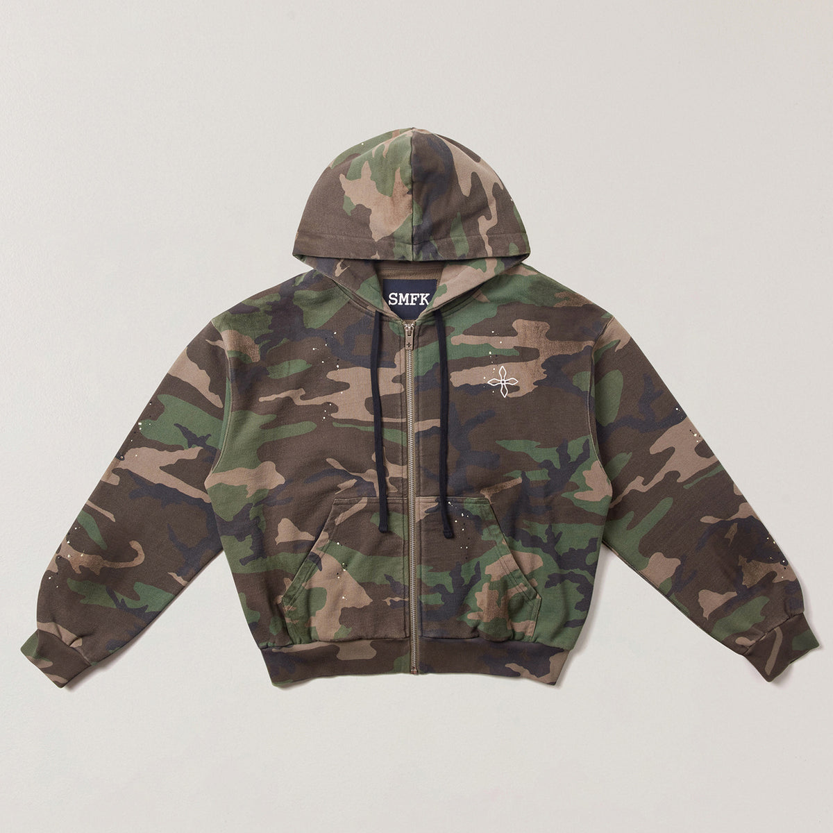 Camo zip-up hoodie with hood and kangaroo pocket, front zipper and drawstrings.