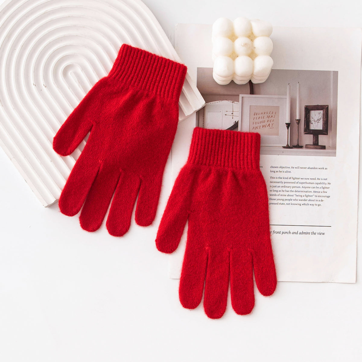 Red knit winter gloves with ribbed cuffs and five-finger design