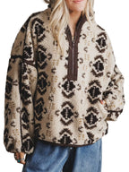 Cream sherpa quarter-zip pullover with aztec pattern, long sleeves, pocket