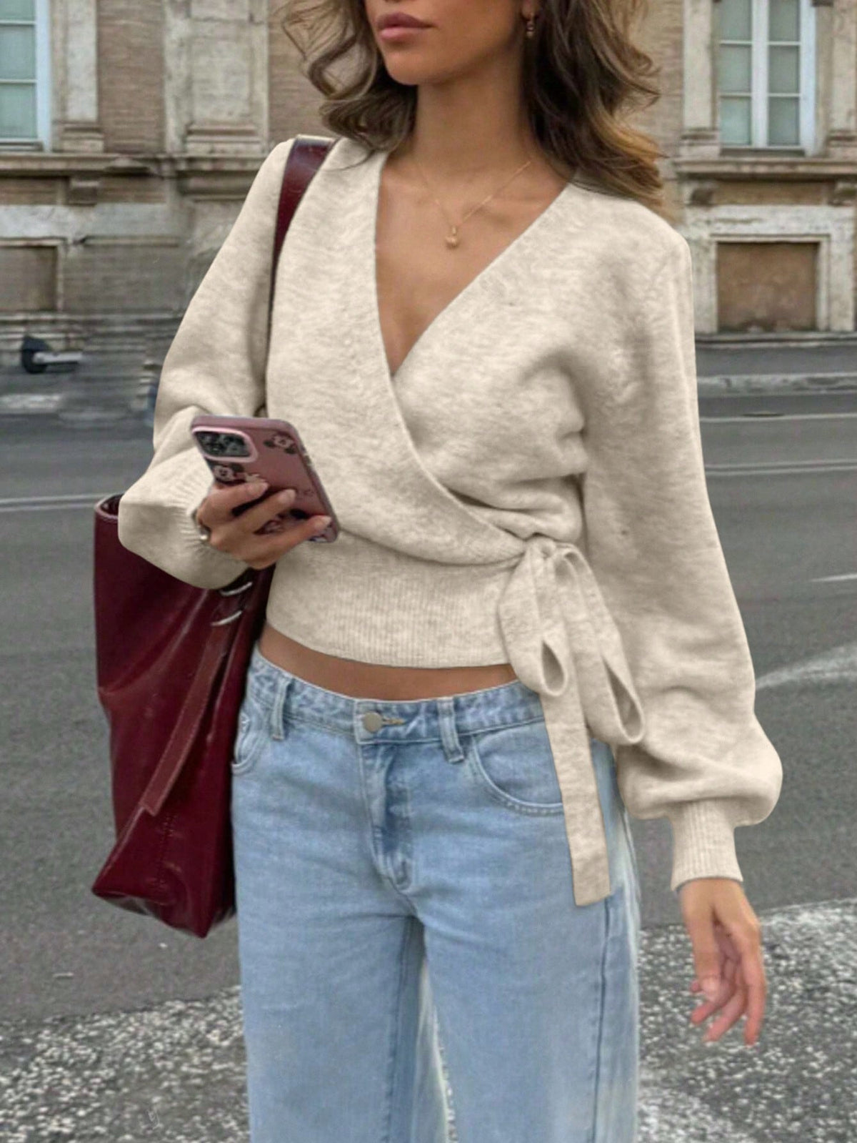 Light gray cropped wrap sweater with V-neck and side tie waist knit top