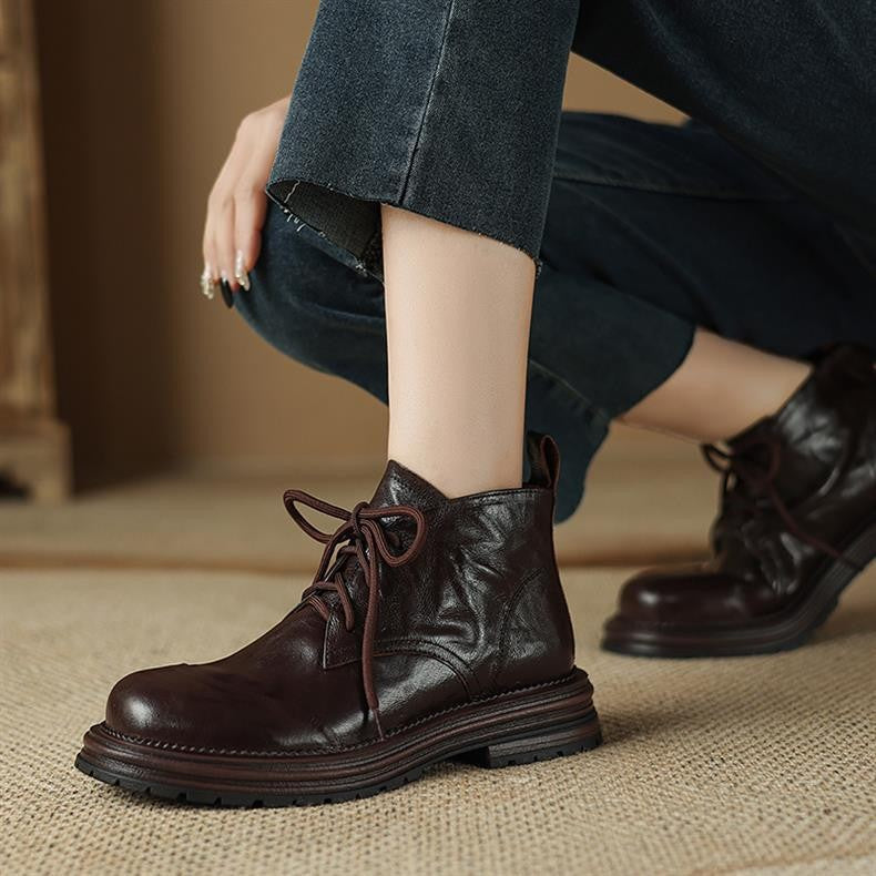 Women’s dark brown lace-up ankle boots with round toe, chunky lug sole, pull tab