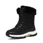Women’s mid-calf faux fur lace-up snow boots in black, quilted upper and lug sole