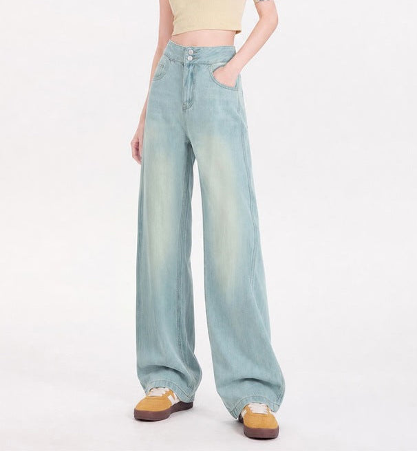 Women's wide-leg jeans, pale blue wash, high rise with button fly and relaxed wide legs