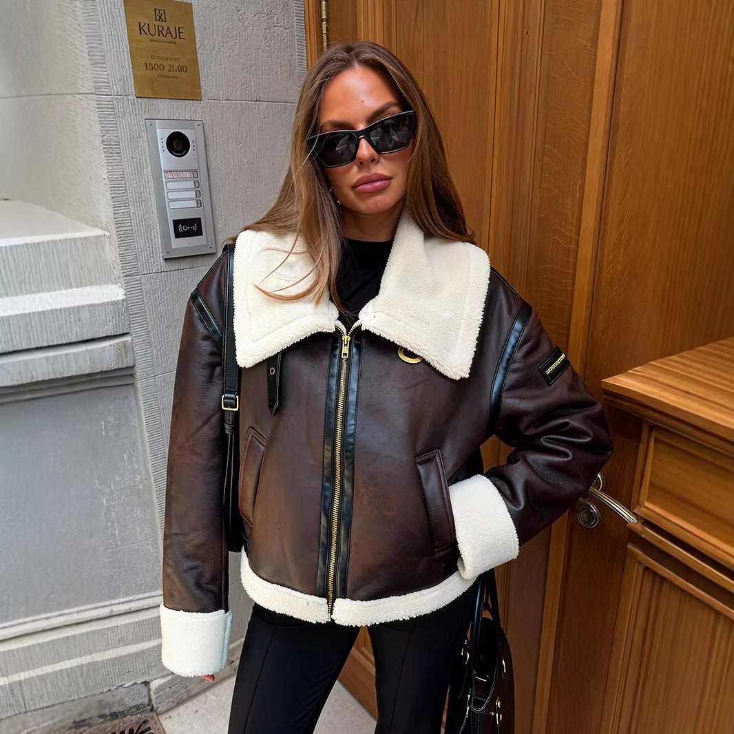 Dark brown faux leather aviator jacket with sherpa trim, center zip, and wide collar