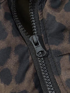 Leopard print nylon puffer jacket zipper detail with black pull tab