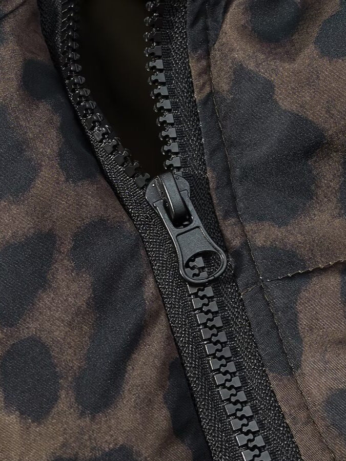 Leopard print nylon puffer jacket zipper detail with black pull tab