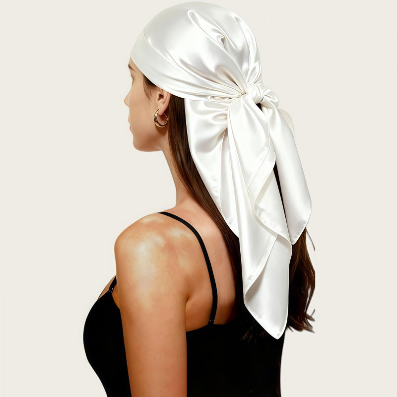 White satin head scarf, large square wrap tied in a side bow