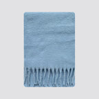 Light blue fringed blanket scarf with brushed soft texture