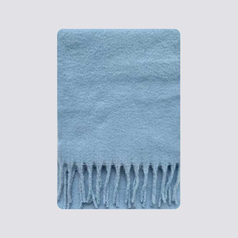 Light blue fringed blanket scarf with brushed soft texture