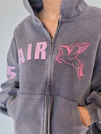 Cropped gray zip-up hoodie with hood and front zipper, pink AIR lettering and winged horse