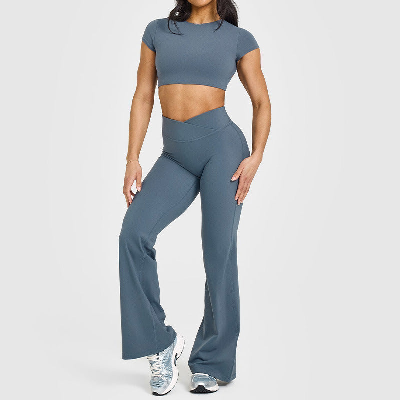 Women’s high-waisted crossover flare leggings in slate blue, wide bootcut pant legs