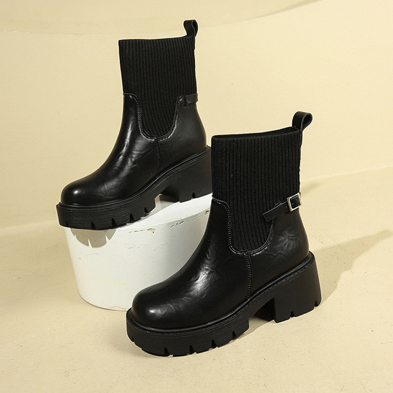 Black ribbed sock boots with buckle strap and thick lug platform sole