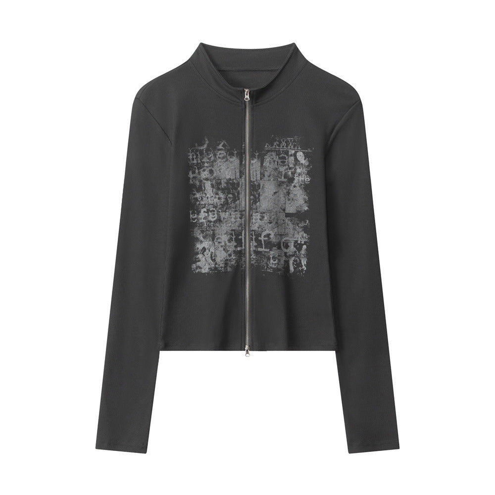 Black long-sleeve zip-up top with stand collar and distressed graphic front