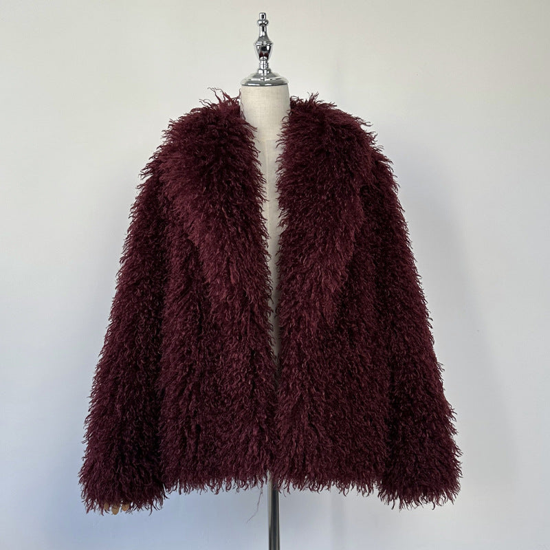 Burgundy shaggy faux fur jacket on a mannequin with shawl lapel, open front
